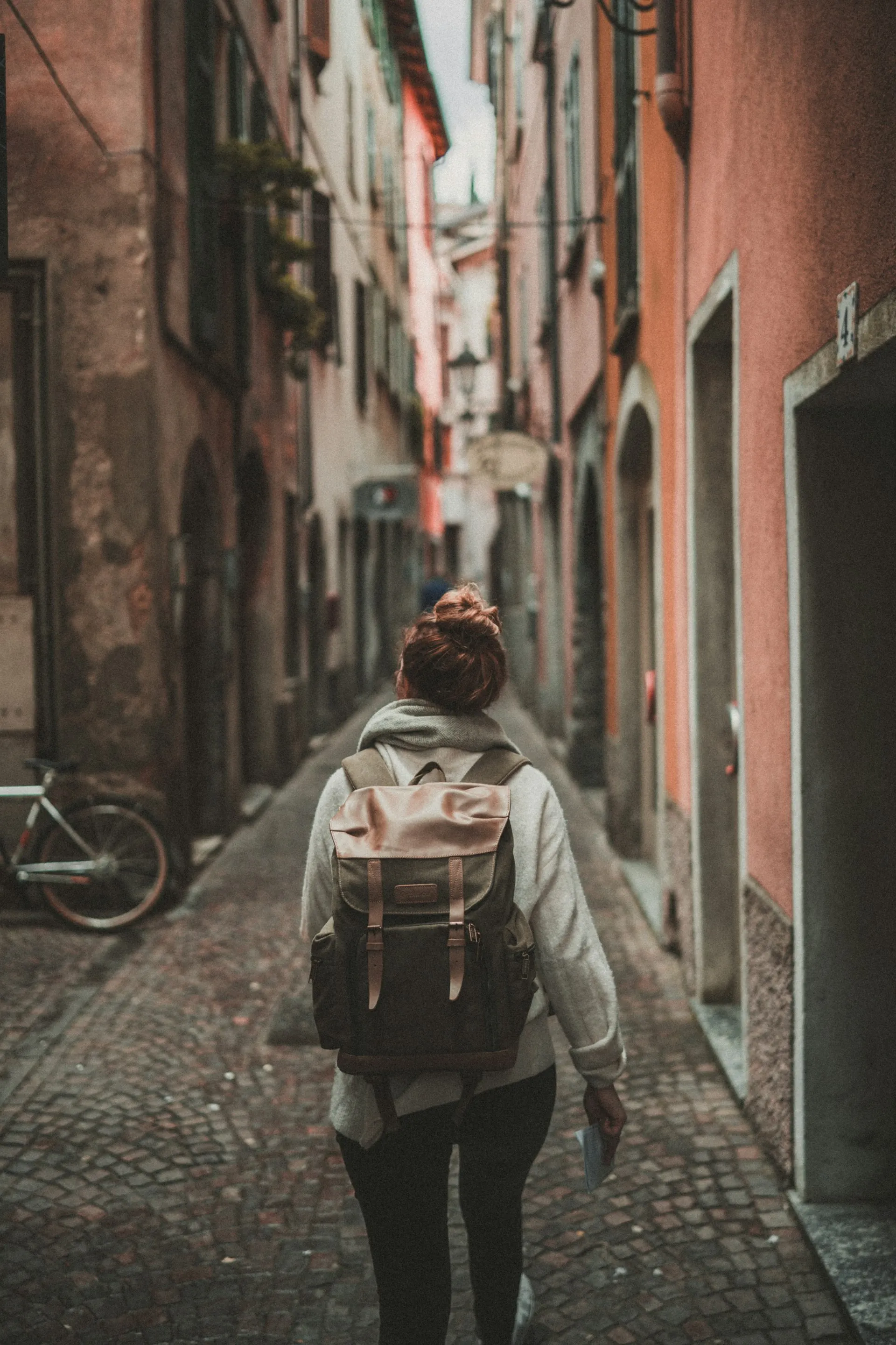 Confident woman walking in urban environment - Solo female travel safety